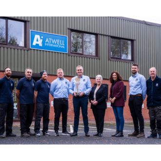 Atwell International Team with their Ellies Europe Award For Best Supplier – Safety Products outside their office